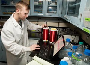 An NRRI researcher working in a lab.