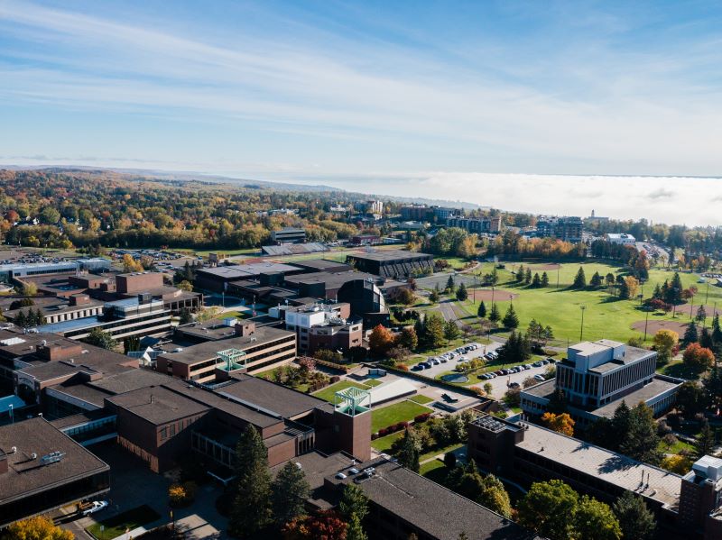 Aerial photo of campus during a cloud inversion over Lake Superior